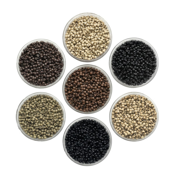 3mm size hair extensions beads in various colours arranged in a circular pattern on a white background.
