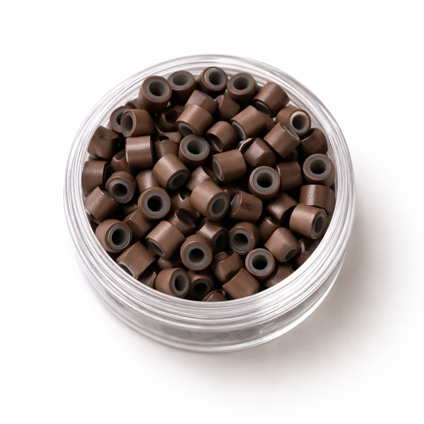 4mm brown #5 silicone lined hair extension beads in clear jar