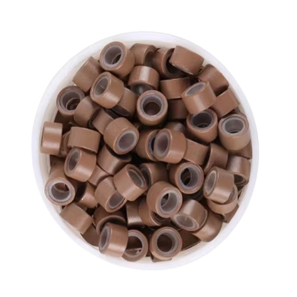 Light Brown 5mm size hair beads in a white bowl on a white background