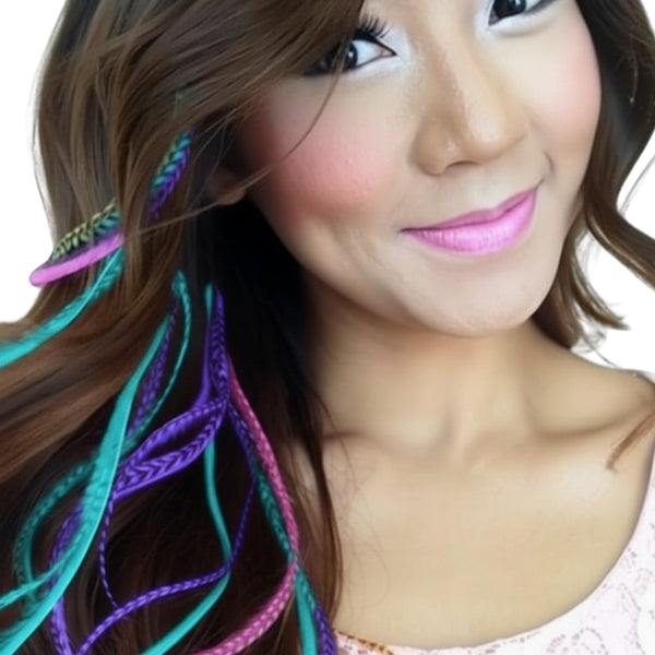 Woman with colorful hair feather extensions in her hair on a white background