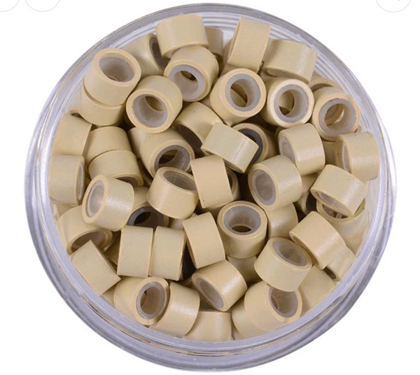 Blonde #13 hair extensions in a clear container 