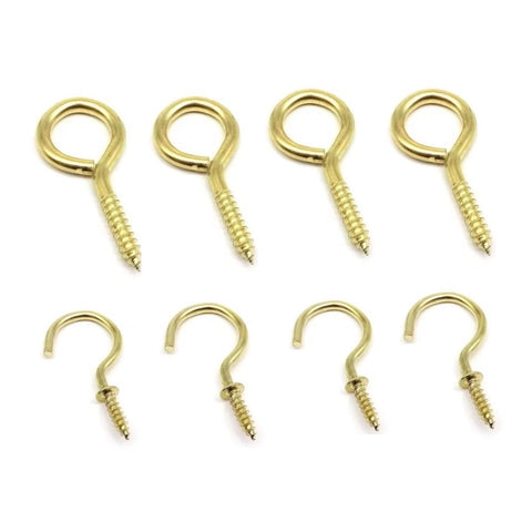 Gold hooks arranged in a grid on a white background