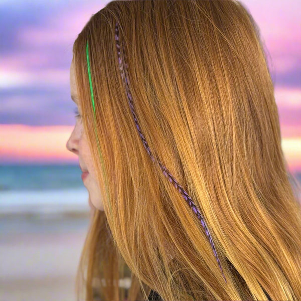 Close-up of a person with colorful hair extensions in a salon setting
