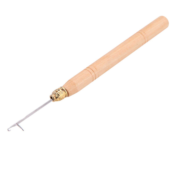 Wooden tool with a metallic loop hair extension latch on tip on a white background