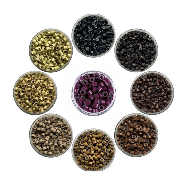 Assorted small round beads in various colors arranged in a circular pattern on a white background.