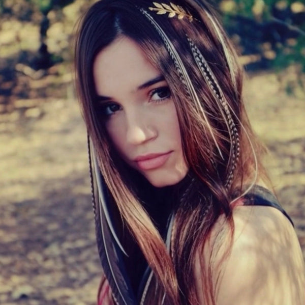Woman with decorative headband outdoors