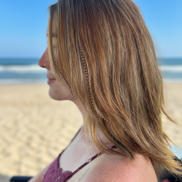 Woman with styled hair in a salon setting