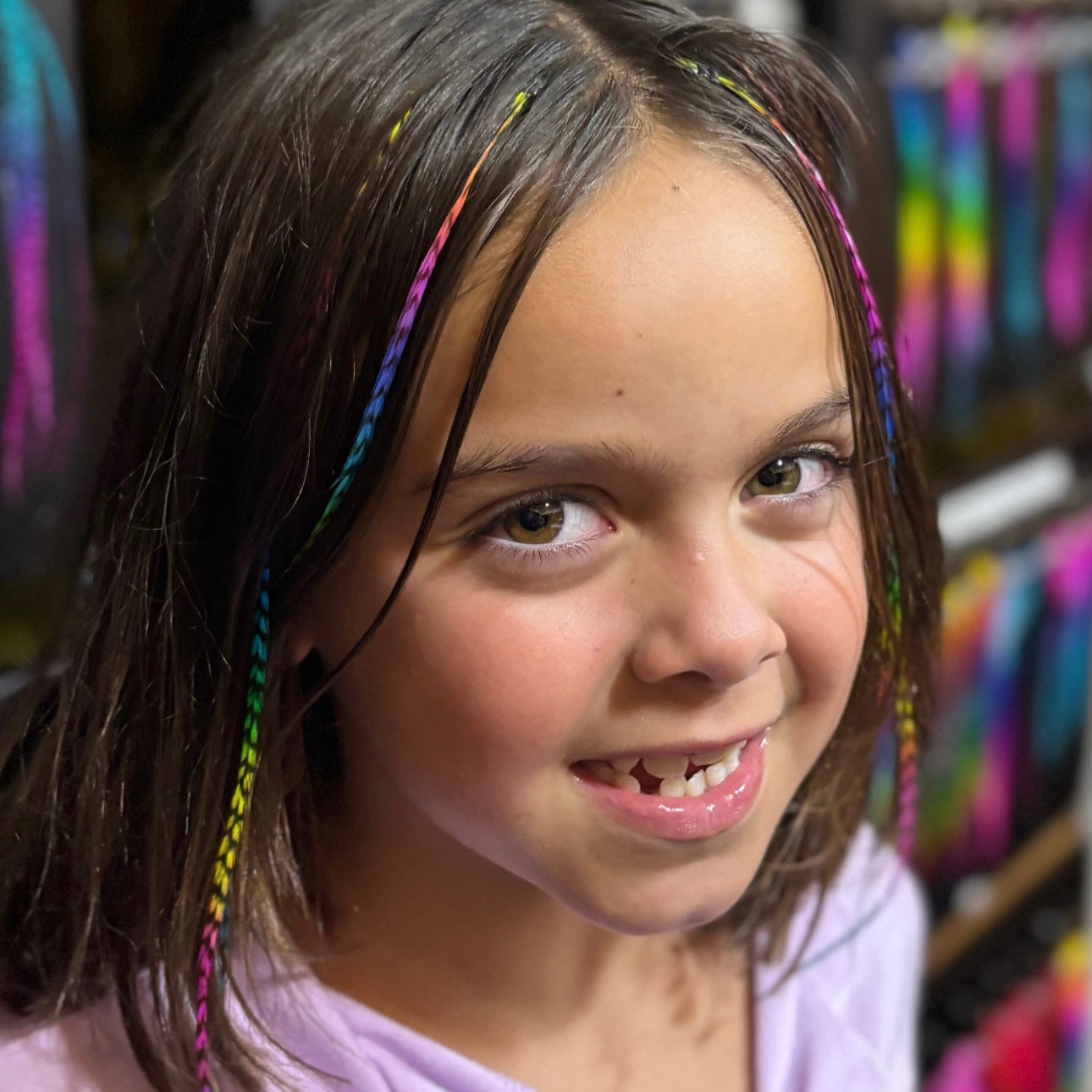 Girl with colorful hair extensions
