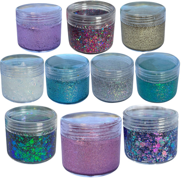 Assorted jars of soft fine and chunky glitters, in various colours, on a white background