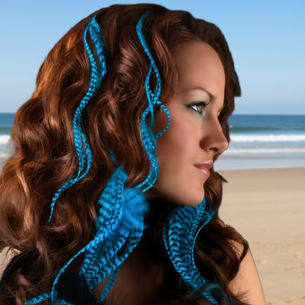 Woman with blue feather hair extensions on a beach