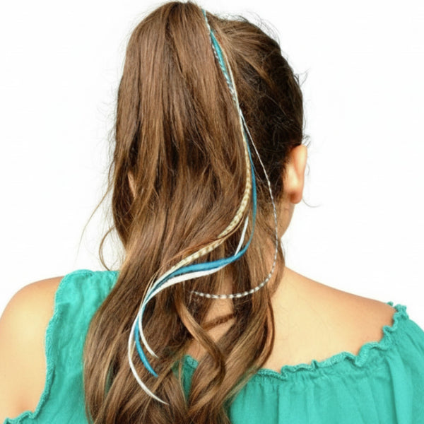 Woman with long brown hair wearing aqua blue turquoise naturals mix feather hair extensions