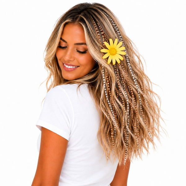 Blonde feather hair extensions in long wavy hair with natural grizzly feathers by Wild4Feathers brand
