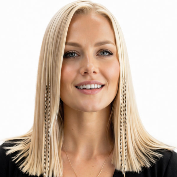 Woman with medium length blonde hair and blonde grizzly variant natural feather hair extensions for light and blonde hairstyles
