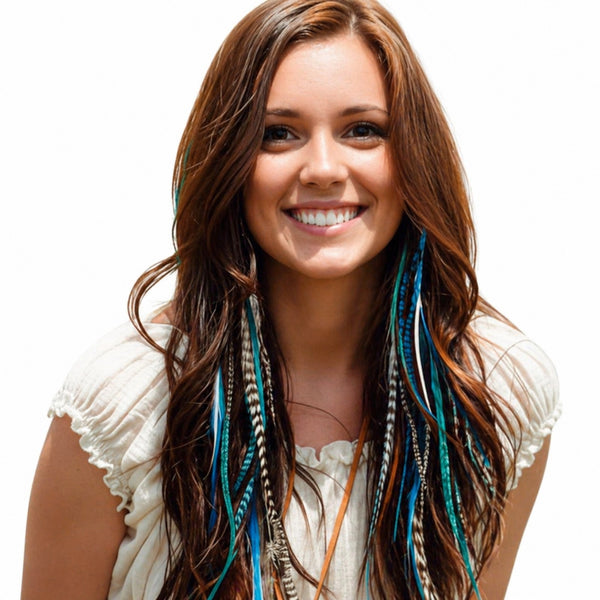 Woman smiling wearing blue turquoise and natural feather hair extensions in long brown hair