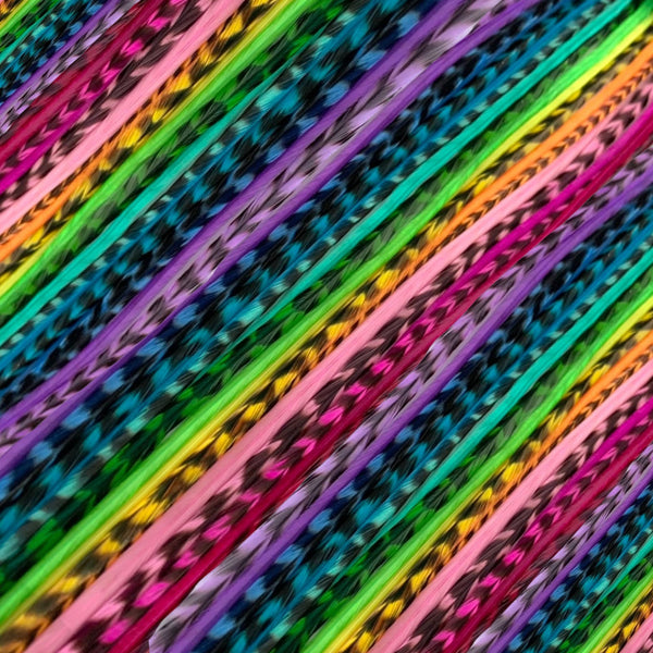 close up of all single colours in grizzly and solid feather hair extensions in regular width ,real striped feathers for  feather hairstyling
