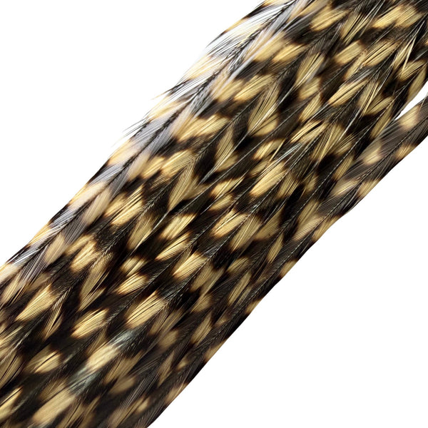 fawn brown grizzly feather hair extensions close-up, natural real grizzly pattern feather strands for hair styling