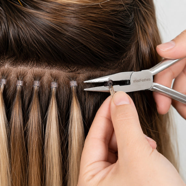 hair bead removal of brunette hair extensions with plier hair tools