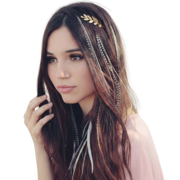 Woman with long hair featuring decorative natural hair feathers on a white background