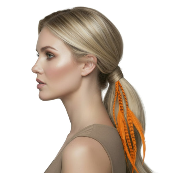 Woman with blonde hair in a ponytail featuring orange extensions on a white background
