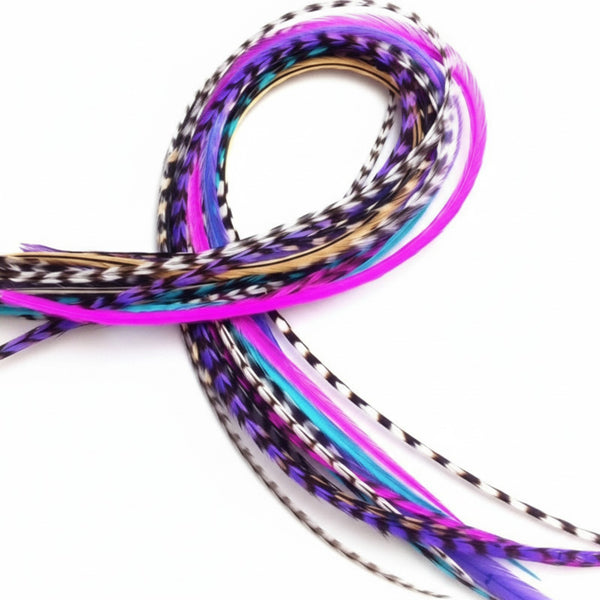 Colorful feather hair extensions on a white background