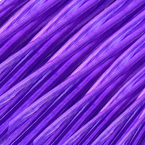 close up of purple solid feather hair extensions in regular width ,real feathers for feather hairstyling