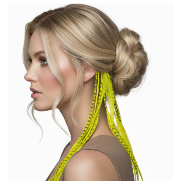 Woman with blonde hair featuring yellow grizzly mix feather hair extensions on a white background