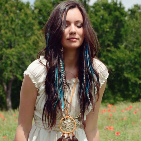Girl wearing Feathers Hair Style